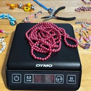 Fuchsia beads on elastic string